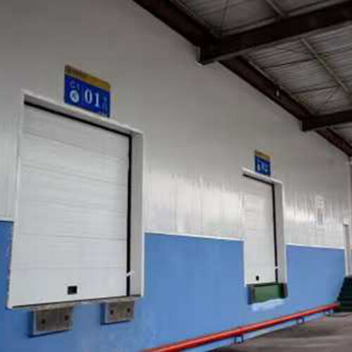 380V 220V Safety Industrial Sectional Overhead Door For Internal Facility Traffic Passages