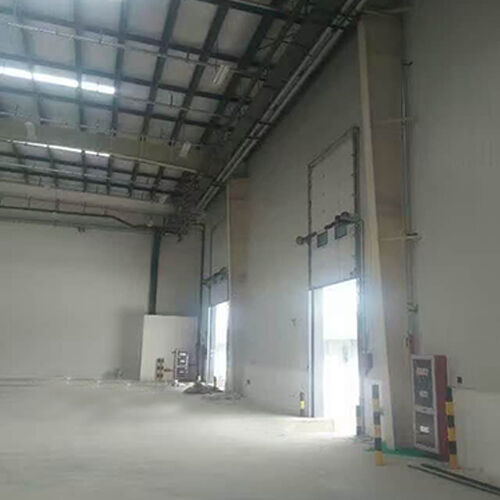 Motorized Anti-Collision Windproof Industrial Sectional Overhead Rolling Door For Facility Access