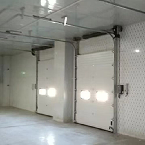 0.2-0.4m/s Speed Industrial Sectional Overhead Door Including Dock Seal For Express Delivery Hubs