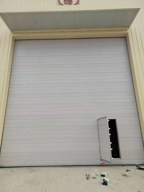 Flexible Lift Configuration Industrial Sectional Overhead Door for High-Ceiling Warehouses with Wind Resistance Level 7-8