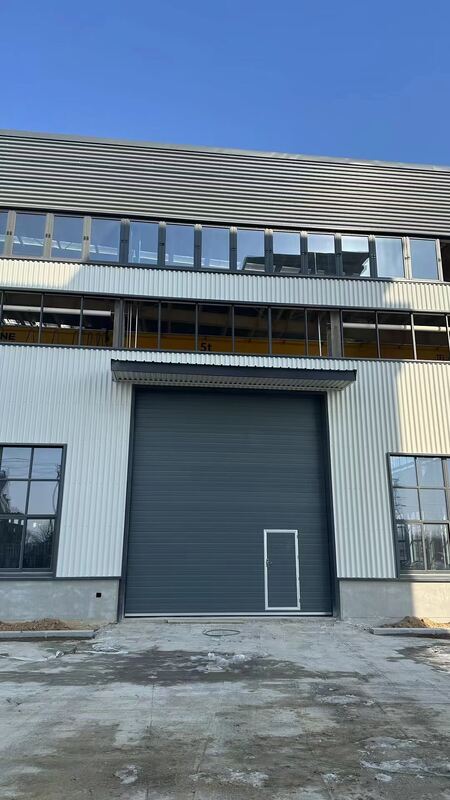 Integrated Pedestrian Door Industrial Sectional Overhead Door with Wind Resistance Level 7-8 and Sound Insulation 24dB for High-Traffic Warehouses