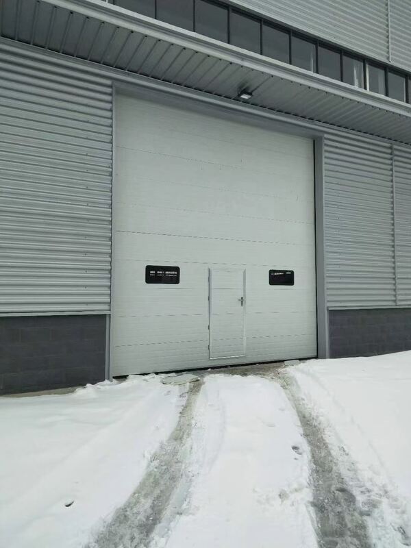 Integrated Pedestrian Door Industrial Sectional Overhead Door with Wind Resistance Level 7-8 and Sound Insulation 24dB for High-Traffic Warehouses