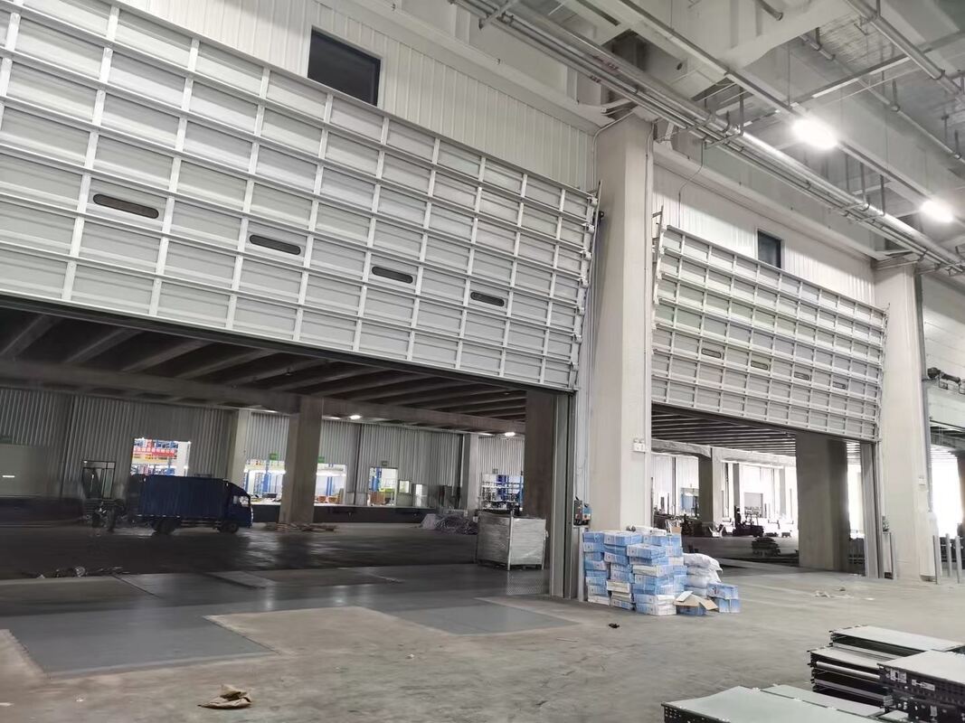 Flexible Lift Configuration Industrial Sectional Overhead Door for High-Ceiling Warehouses with Wind Resistance Level 7-8